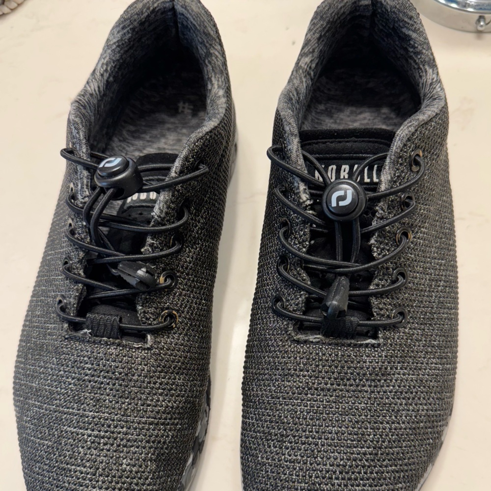 NOBULL Black Heather Trainers. 
Men’s 9, Women’s 10.5
